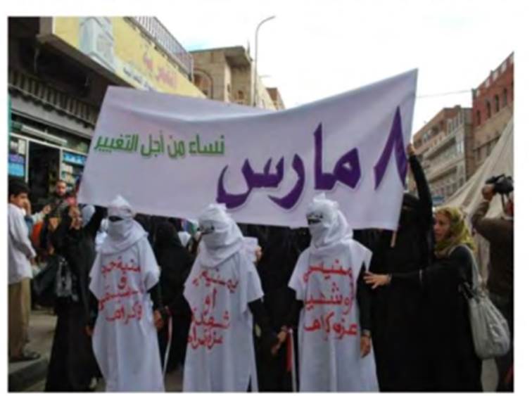 A group of people holding a bannerAI-generated content may be incorrect.